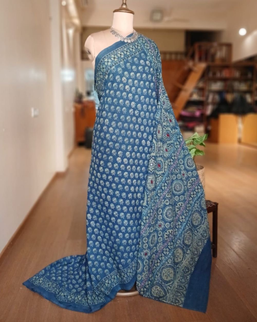 Barmer Ajrakh with Embroidered Palla Mul Cotton Saree – (AMCE1117)